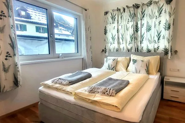 Bedroom 1, double bed  Lasserhäusl by Alpenidyll Apartments