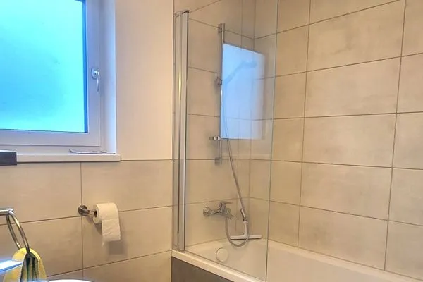 Bathroom 3, bathtub and toilet  Lasserhäusl by Alpenidyll Apartments