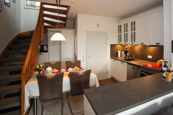 offene Küche mit Eßbereich Residenz am Rosengarten Residenz am Rosengarten Whg. 29 Parkblick