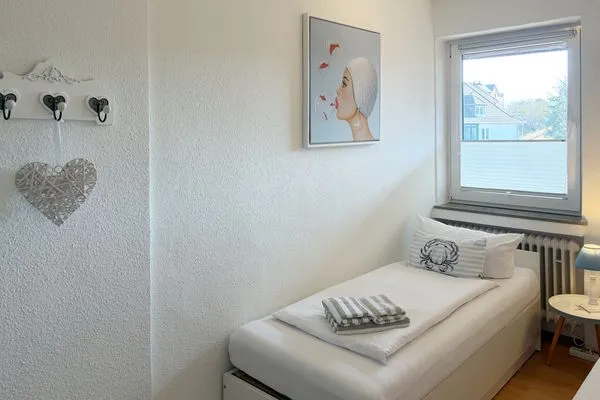 Schlafzimmer Haus Diana Ferienwohnung „Kniepsand"