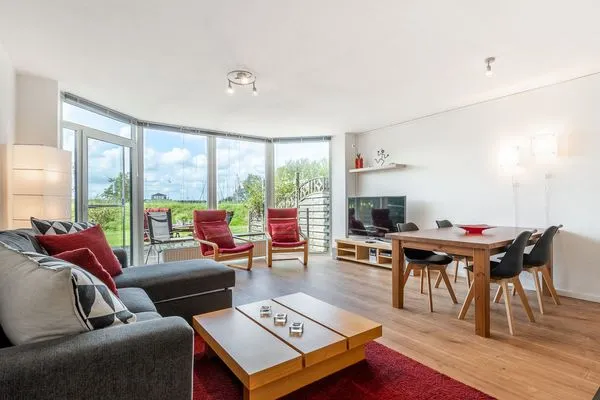 Wohnzimmer  Ferienwohnung Schleiwiese mit Meerblick in Stexwig