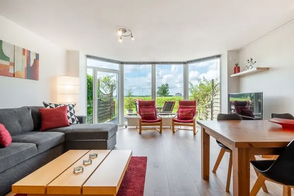 Wohnzimmer  Ferienwohnung Schleiwiese mit Meerblick in Stexwig