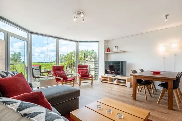 Wohnzimmer  Ferienwohnung Schleiwiese mit Meerblick in Stexwig