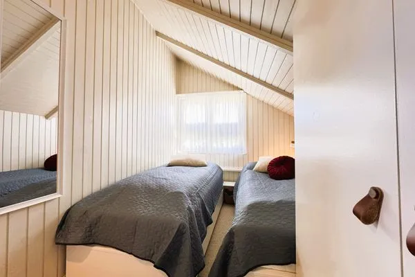 Schlafzimmer mit zwei Einzelbetten (90 x 200 cm)  Immi's Hus - Ferienhaus am Ostseestrand