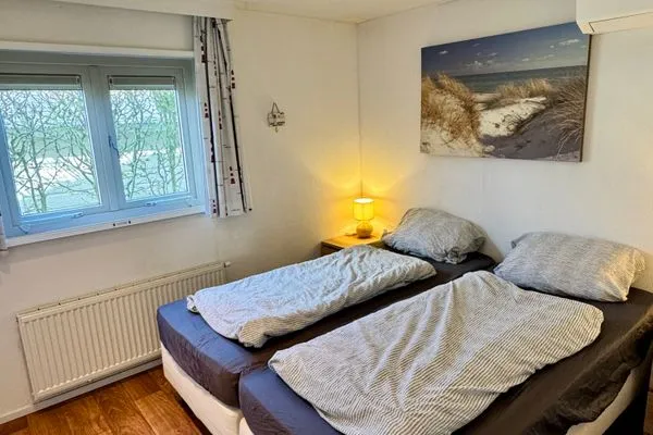  EuroParcs Schoneveld / Breskens Huis Zeemeeuw mit Zaun Haus Nr. J250