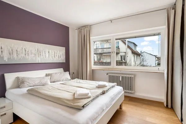 Ferienhaus Bahnhofstrasse Ferienwohnung Morgensonne Langenargen - Schlafzimmer - Doppelbett