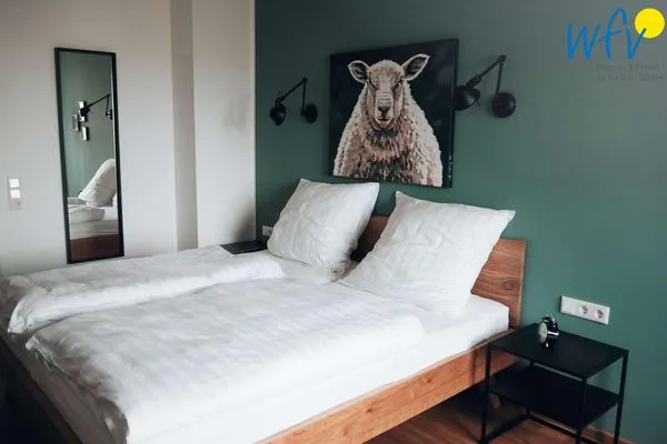 Schlafzimmer Appartement-Haus Regina Ferienwohnung zehn