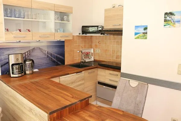 Küchenbereich und Esstisch  Haus Weststrand W2