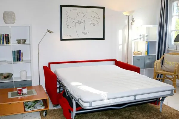 gemütliche Schlafcouch (ausgeklappt) für 3. Person  Darßer Wald