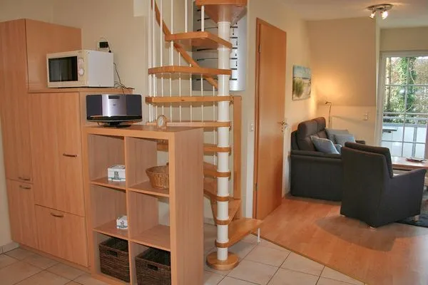 Wendeltreppe im Wohnbereich zum zweiten Schlafzimmer im Dachgeschoß  Haus auf dem Reff W8