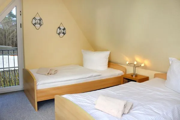 Schlafzimmer II (Größe der Betten: Standard)  Haus auf dem Reff W8