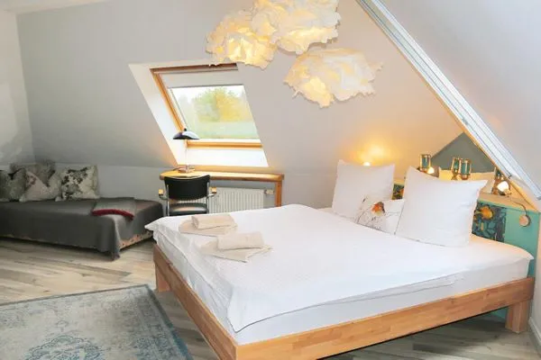 Schlafbereich im Dachgeschoß Zum Leuchtturm Wohnung 9