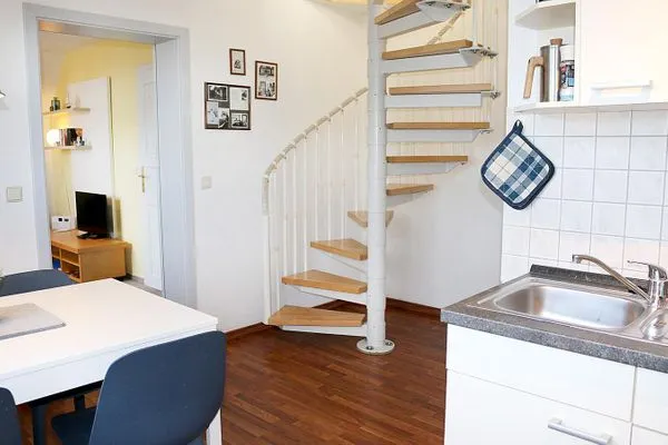 Wendeltreppe ins Dachgeschoß mit offenem Schlafzimmer Katharinas Ferienhaus Wohnung 3