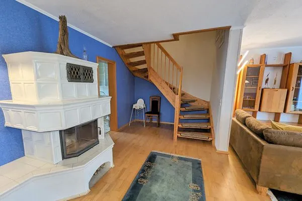 Kamin und Treppe zum Obergeschoss  Haus Svea