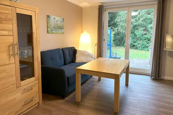 Wohnzimmer mit Zugang zur eigenen Terrasse Haus Kleist Wohnung 3