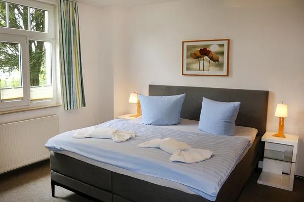 Schlafzimmer mit Doppelbett Katharinas Ferienhaus Wohnung 2