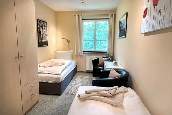 zweites Schlafzimmer mit zwei Einzelbetten  Deichrose W9