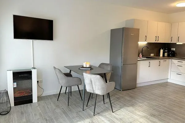 Kamin, Essbereich und Küche Waldsiedlung W10.3