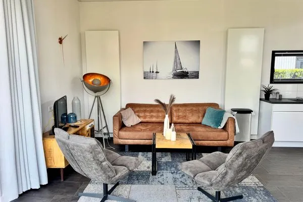  EuroParcs Bad Meersee Chalet Coastline Zeeland mit Zaun Haus Nr. 80