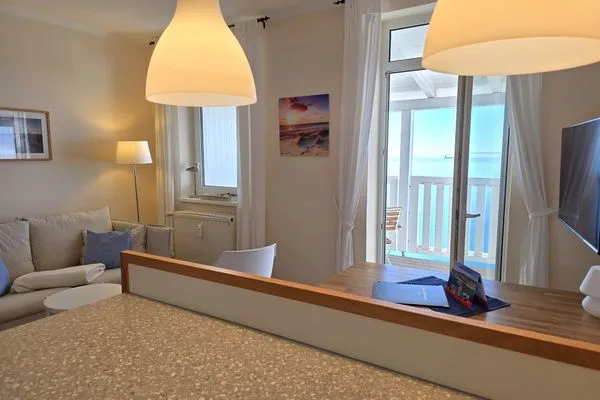 Wohnzimmer  Fürstenhof, App. 403 - erste Reihe am Meer