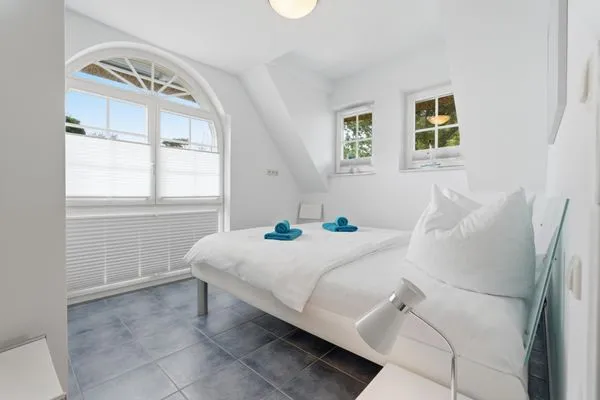 Schlafzimmer mit Doppelbett  de Obendtied - Wohnung 4