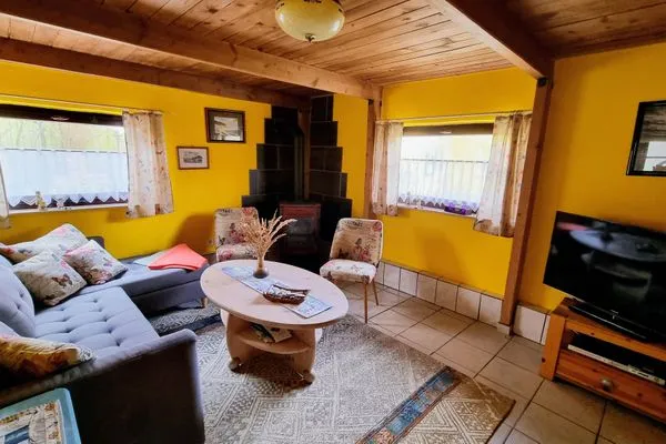 Wohnzimmer  Ferienhaus Julchen - mit Garten, Grillplatz, Sauna