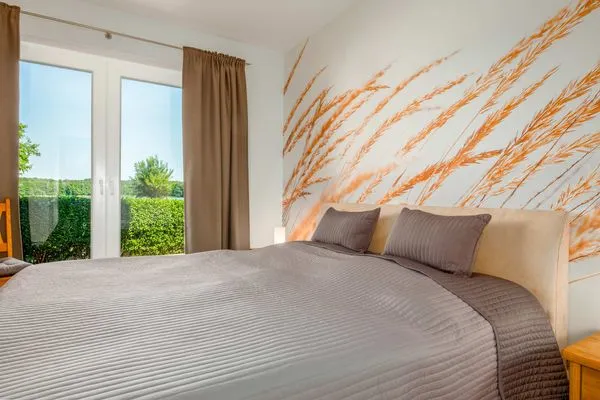 Schlafzimmer  Ferienwohnung Krebssee Idyll 1