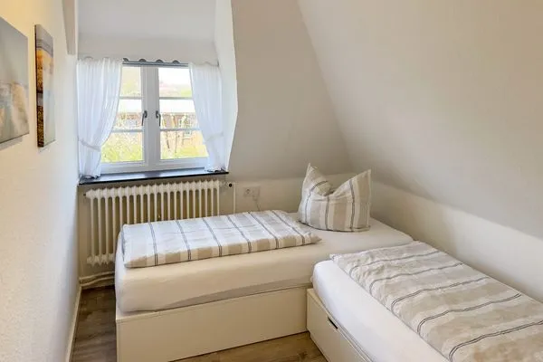 Schlafzimmer Haus Frisia Ferienwohnung Frisia 5