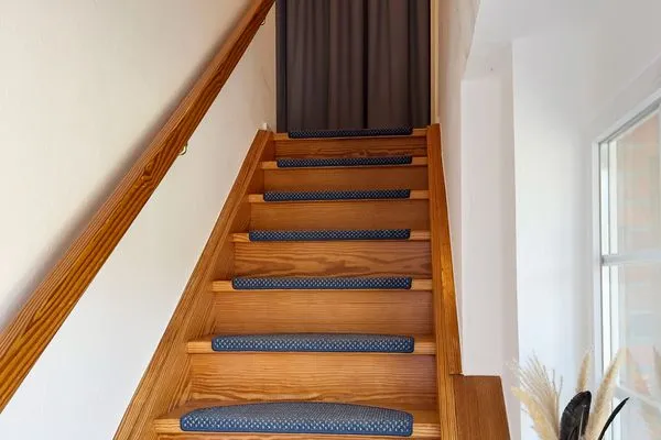 Treppenaufgang zur Wohnung Haus Frisia Ferienwohnung Frisia 5