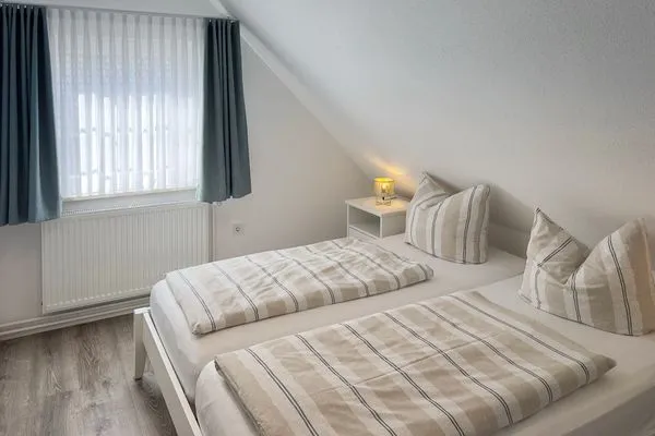 Schlafzimmer Haus Frisia Ferienwohnung Frisia 4