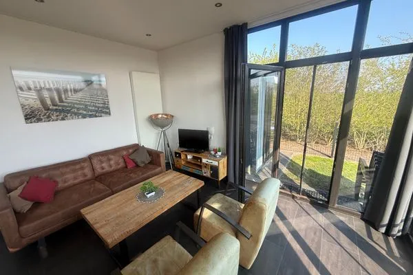  EuroParcs Bad Meersee Chalet Küstenzeit mit Zaun Haus Nr. 97