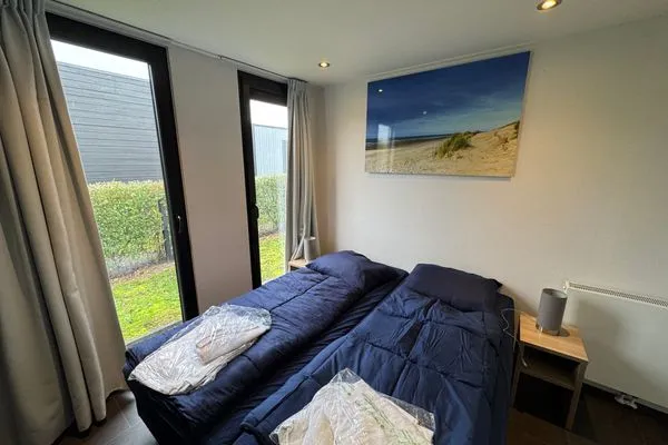  EuroParcs Bad Meersee Chalet Küstenzeit mit Zaun Haus Nr. 97