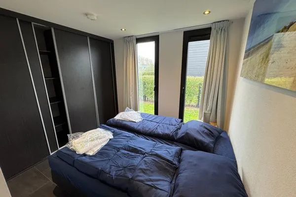  EuroParcs Bad Meersee Chalet Küstenzeit mit Zaun Haus Nr. 97