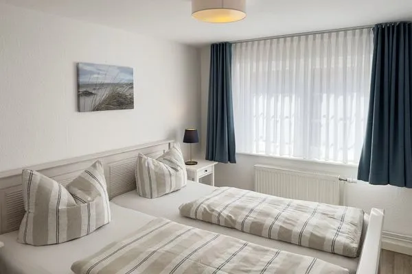 Schlafzimmer Haus Frisia Ferienwohnung Frisia 3