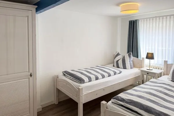 Schlafzimmer Haus Frisia Ferienwohnung Frisia 3
