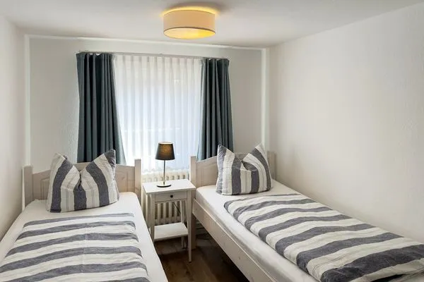 Schlafzimmer Haus Frisia Ferienwohnung Frisia 3