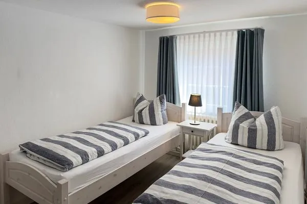 Schlafzimmer Haus Frisia Ferienwohnung Frisia 3