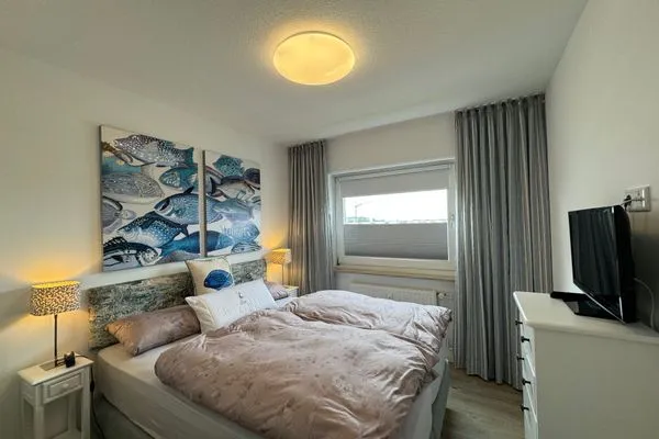 Schlafzimmer Ferienwohnung im Haus Nordland App.102