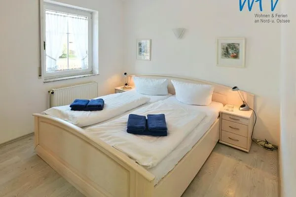 Schlafzimmer Haus vorm Riff Ferienwohnung Memmertfeuer