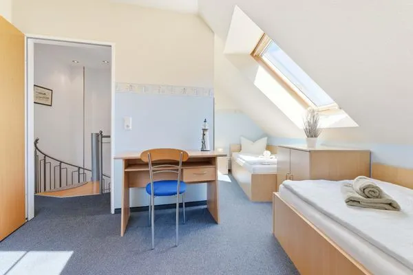 Schlafzimmer mit zwei Einzelbetten Am Deich Am Deich Haus 24
