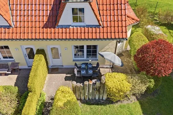 Terrasse mit Sonnenschirm und Grill Am Deich Am Deich Haus 24