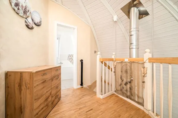 Ferienhaus Tamika am Tollensesee - Treppe in das Erdgeschoss  Tamika