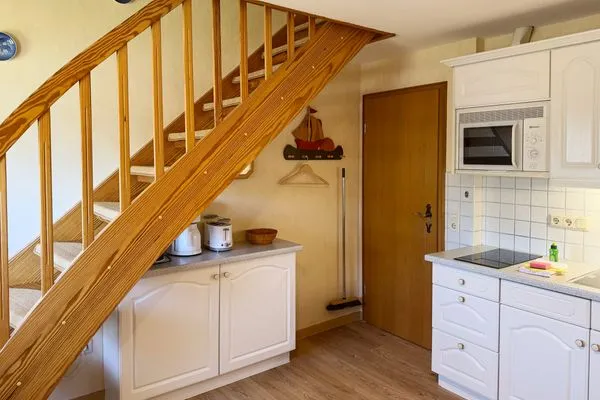 Treppe zu den Schlafzimmern Haus *Üüs Aran* Ferienwohnung *Üüs Aran 6*