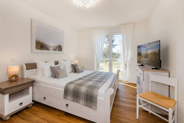 Schlafzimmer  Ferienwohnung Sonnenblick am Haff