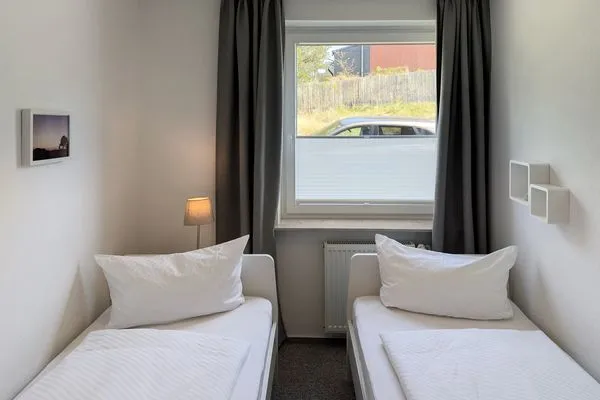 Schlafzimmer  Ferienwohnung *Meeresleuchten*