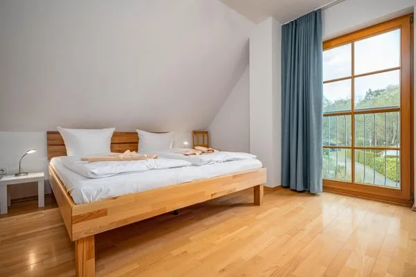 Schlafzimmer mit Doppelbett (OG) Ferienpark Freesenbruch Doppelhaushälfte 10a - Meeresbrise