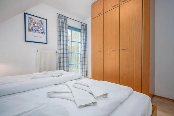 Schlafzimmer mit Doppelbett Ferienpark Freesenbruch Doppelhaushälfte 12 - Sommerlust