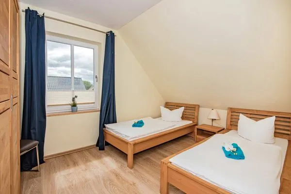 Schlafzimmer  Ferienhaus Angela 1