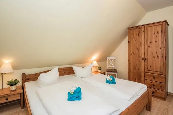 Schlafzimmer  Ferienhaus Angela 2