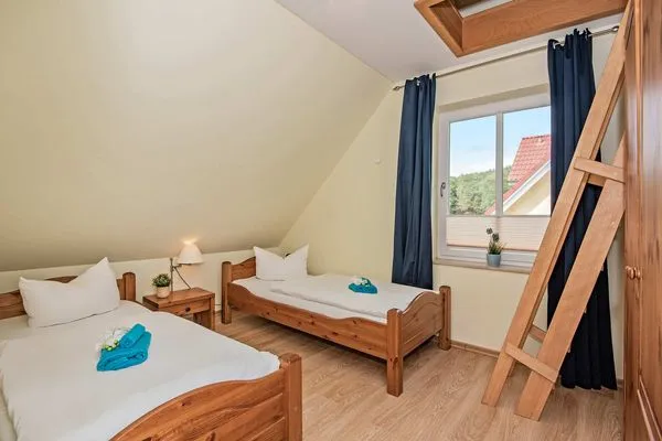 Schlafzimmer  Ferienhaus Angela 2
